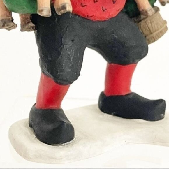 Candy Design Norway Santa like Gnome figurine holding 2 pigs approximately 6” - Picture 11 of 13